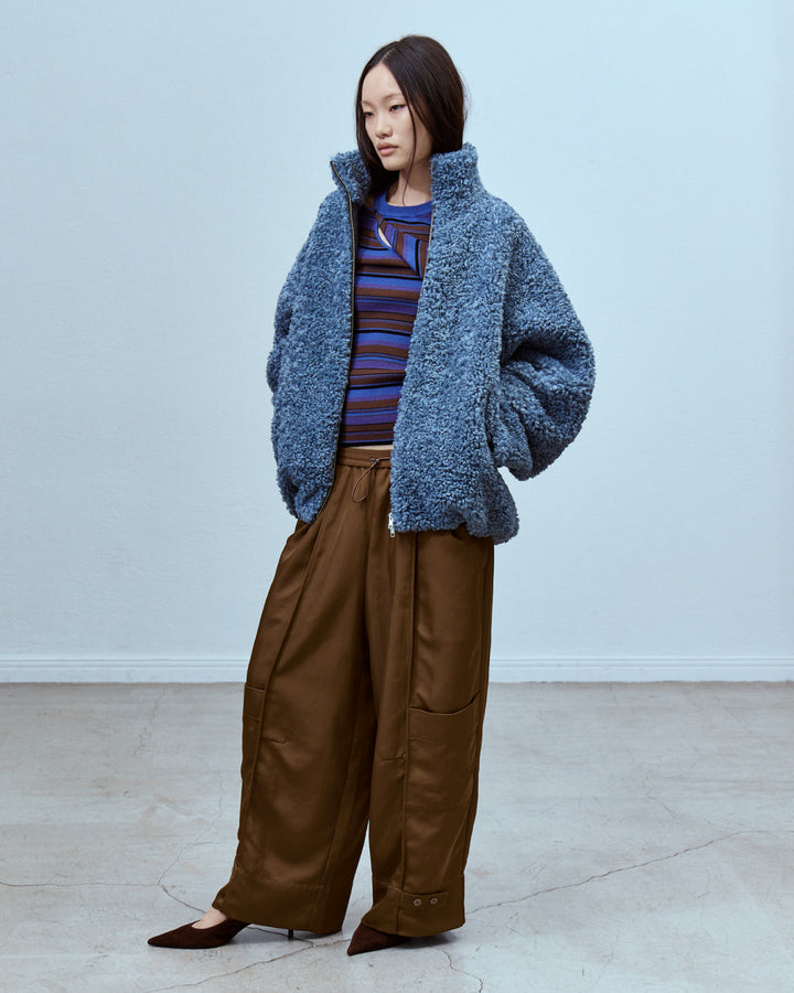 ASYMMETRY SLANT-FLAP RIB KNIT