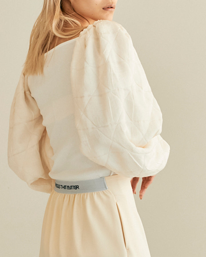 CONFLICTING POWER SLEEVE BLOUSE